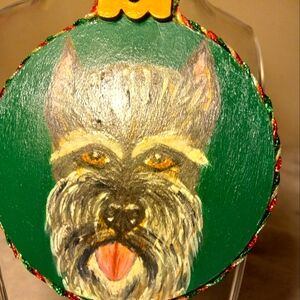 Handpainted, handmade on wood mini schnauzer ornament with hanging ribbon.